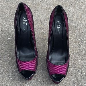 Pink and black detailed heels